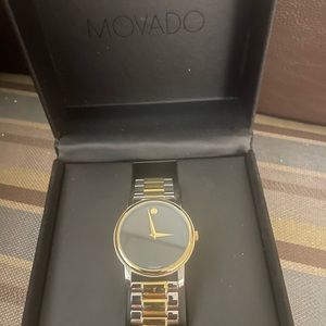 SOLD‼️MOVADO Swiss Movement stainless steel silver/gold band w/black face jewel